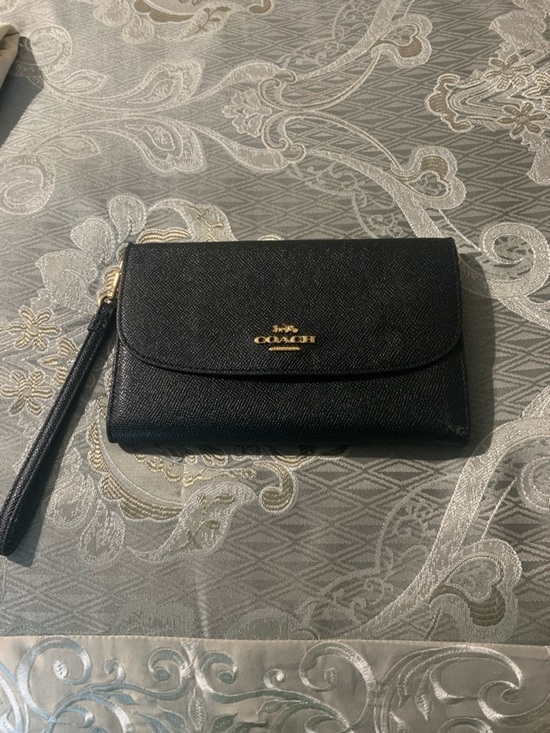 Coach Handbags - Coach Black Leather Wristlet/Crossbody with Gold Logo
